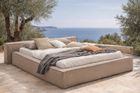 Linen bed in a Mediterranean outdoor setting with natural fabrics and soft neutral tones, by Palma Beds Mallorca. Linen bed in a Mediterranean outdoor setting with natural fabrics and soft neutral tones, by Palma Beds Mallorca.