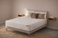 PARADISE upholstered bed base with wooden legs, elegant and minimal bedroom design.