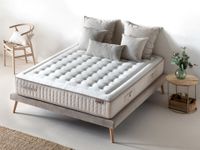 CASHMERE natural comfort mattress on upholstered bed CASHMERE natural comfort mattress on upholstered bed