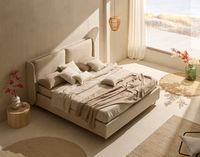 ELSA stoppad förvaringssäng med mjukt formad sänggavel i ljust sovrum