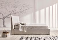 storage bed in a Mediterranean style in white linen storage bed in a Mediterranean style in white linen