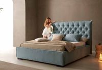 Palmabeds DAFNE storage bed in natural linen with capitonné upholstered headboard in a soft blue tone Palmabeds DAFNE storage bed in natural linen with capitonné upholstered headboard in a soft blue tone